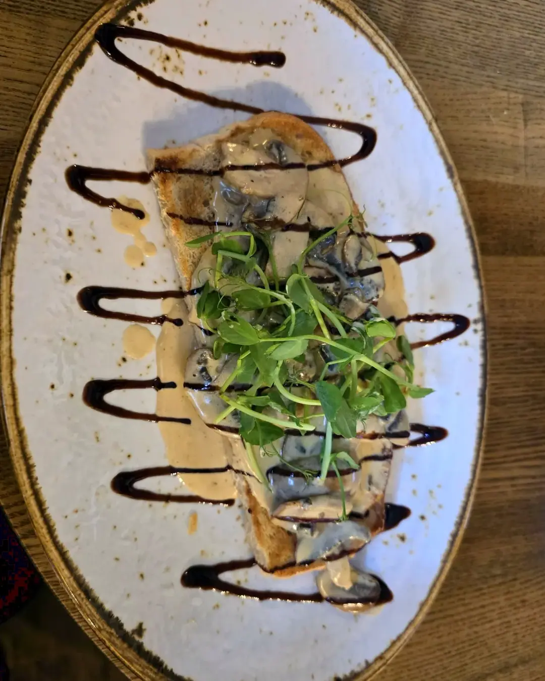 Creamy garlic mushrooms on toasted sourdough with balsamic
